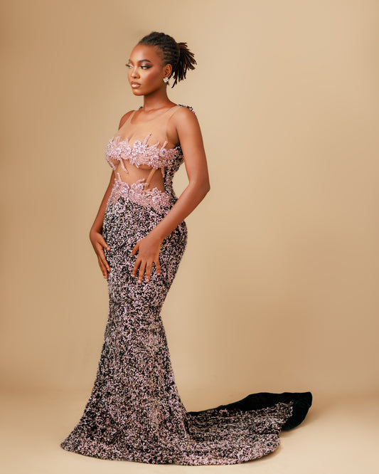 Woman wearing a floral evening gown with a beige background